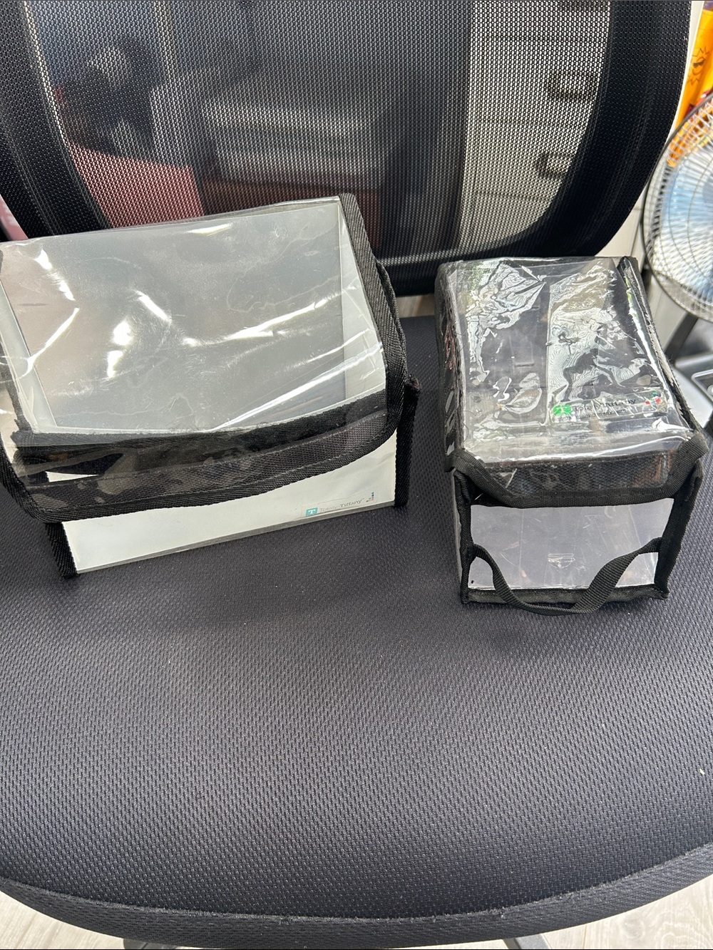 Totally Tiffany vinyl Storage Pouches with Black Trim.